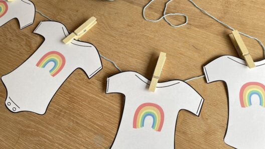 regenboog thema babyshower slinger